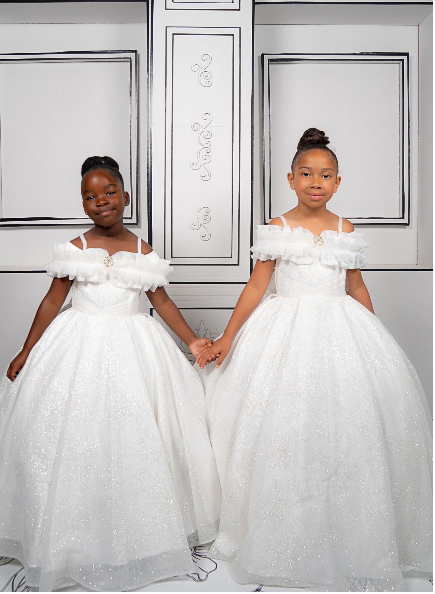 This elegant white ball gown is perfect for flower girls and little brides. With sparkly tulle and a dreamy silhouette, it’s a fairytale favorite.