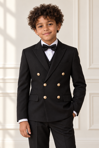 Mixed-race boy wearing black double-breasted gold-button suit, detail view