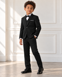 Mixed-race boy modeling Boys Black 3-Piece Suit - angled view