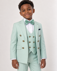 Black boy wearing mint green five-piece tuxedo, jacket and vest detail